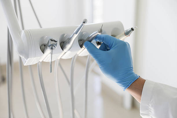 Professional Root Canal Treatment technician working in Brenham, TX